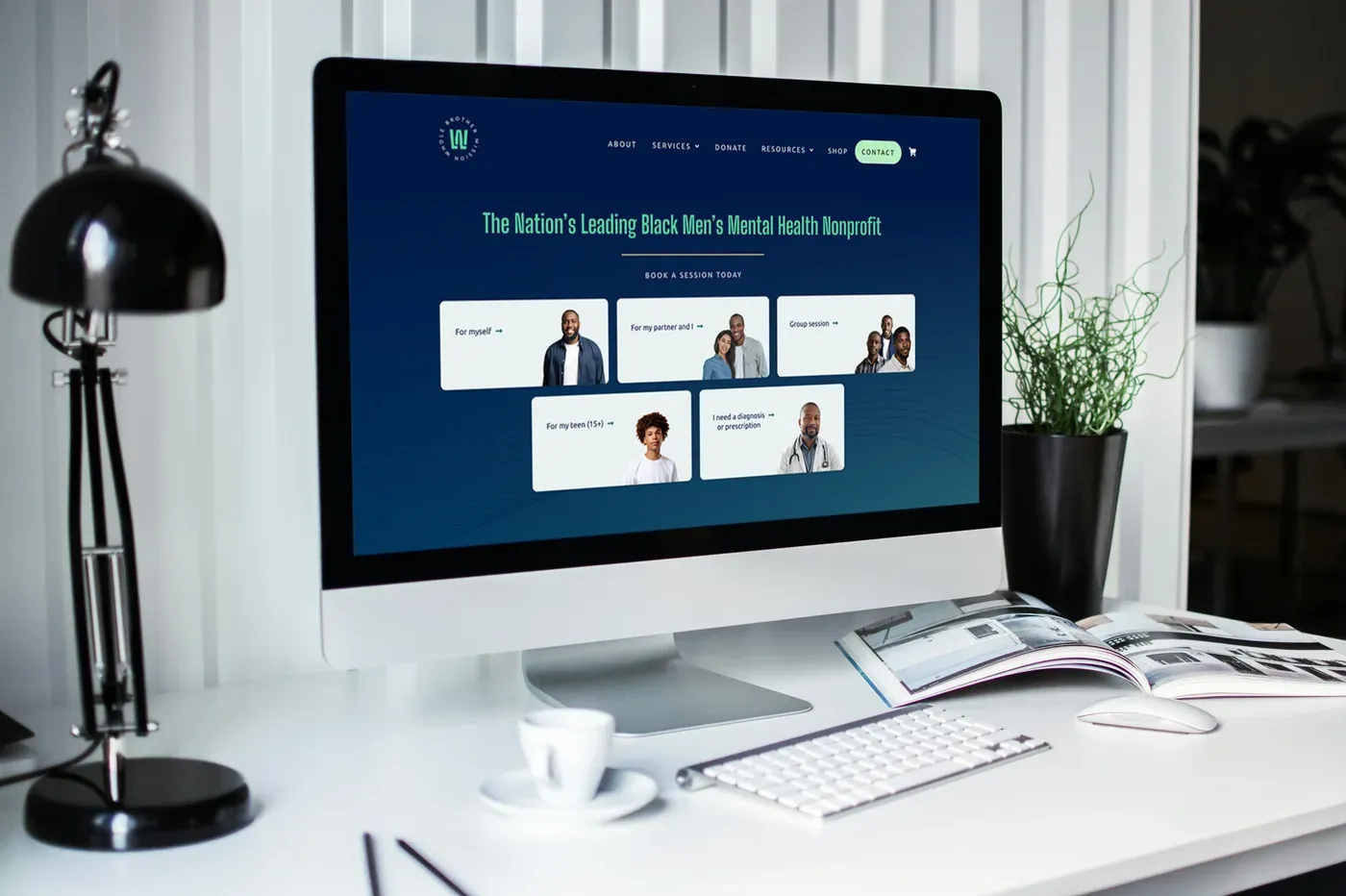 Whole Brother Mission website shown on a desktop monitor